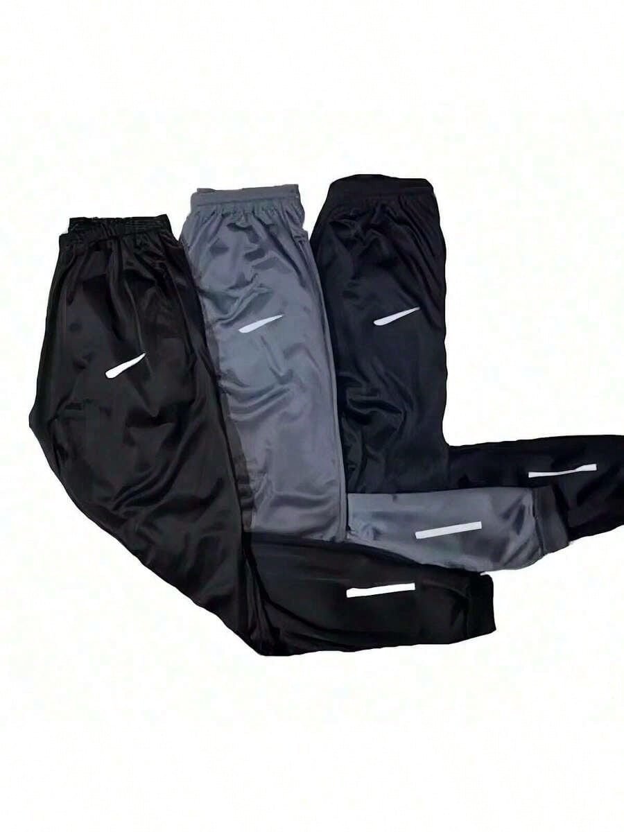 🛒KIT 3 Calça infantil academia jogger com logo refletivo(Preta,Azul marinho,Cinza) 1.0k+ vendido